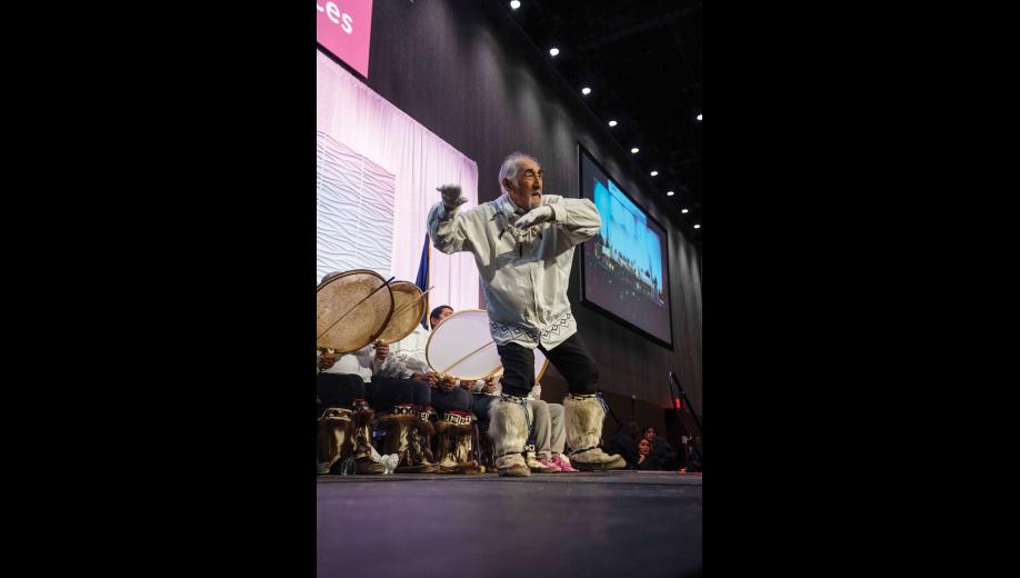 QUYANA NIGHT— Earl Kingik with Tikigaq Traditional Dancers of Point Hope performs onstage during Quyana Night 2 on Friday, October 23. Photo by Ariana Crockett O’Harra