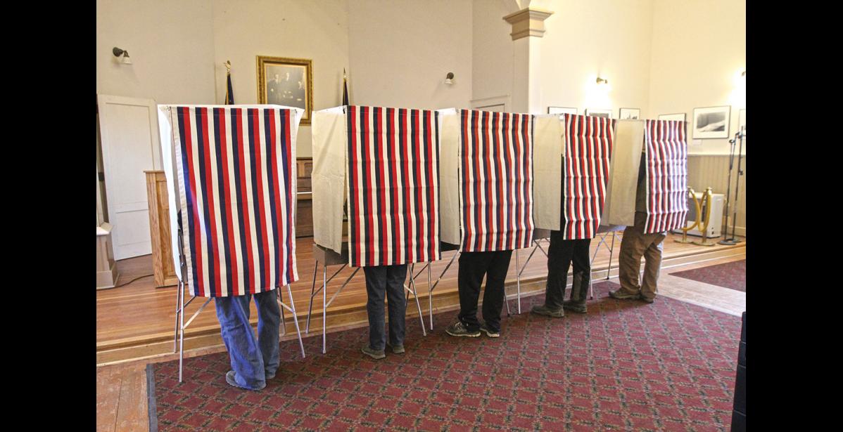 Photo by Nils Hahn Nome voters cast their ballots in voting stations at Old St. Joe's Hall, on election day, Nov. 8, 2016.