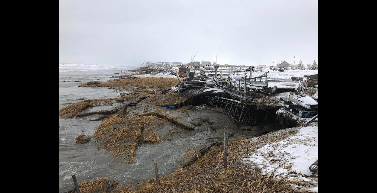 Photo by Bessi Sinnok ERODED— During last week’s storm, the Chukchi Sea facing shoreline of Sarichef Island was pounded by high waters and eroded into the sea.