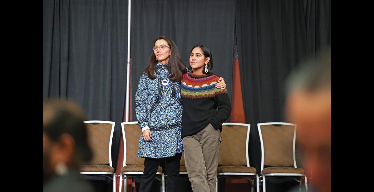 Photo by Megan Gannon AARIGAA — Peltola and her daughter listen to a group from the Northwest Arctic region sing the Iñupiaq hymn “Aarigaa.”