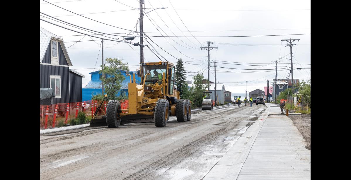 GRADING – A Knik Construction crew member grades Steadman Street on Thursday, August 6 Photo by Ariana Crockett O'Harra