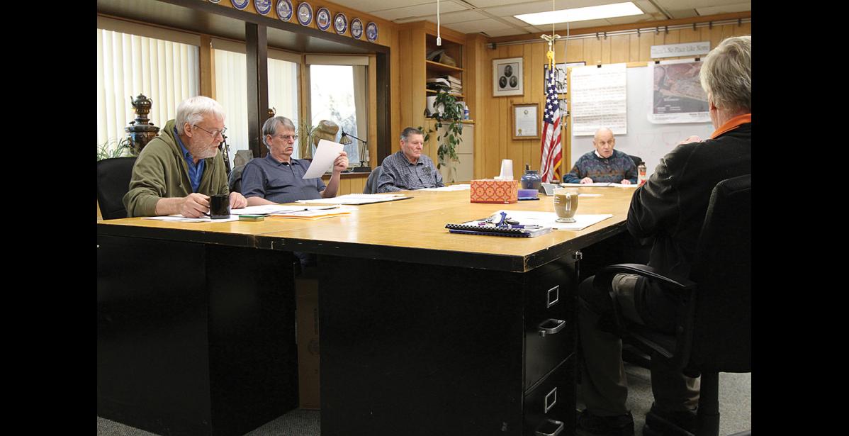 Photo by Diana Haecker COUNCIL— Councilmen Stan Andersen, Jerald Brown, Louie Green Sr., Mayor Richard Beneville and councilman Lew Tobin get ready for Monday’s regular common council meeting.