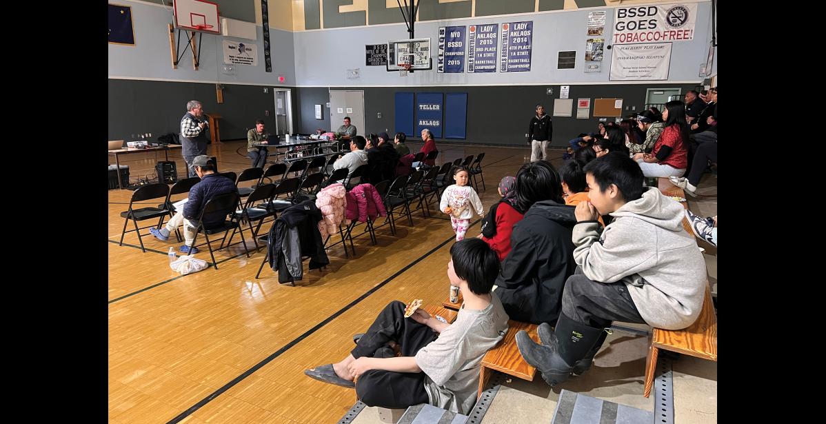 Photo by Diana Haecker PUBLIC MEETING— Graphite One representatives inform Teller residents in a meeting on June 2 at the Teller James Isabell School gym on updates to the proposed graphite mine.