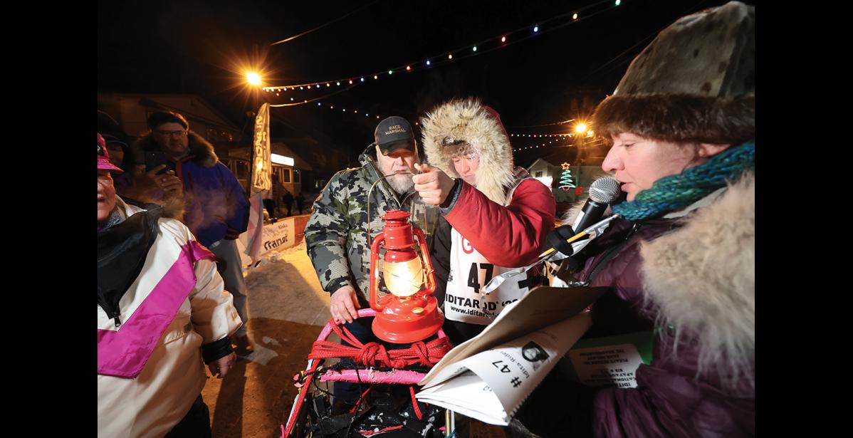 Photo by Diana Haecker RED LANTERN— Apayauq Reitan was the last musher to cross the finish line and bring the 2022 Iditarod to an end, on Satursday, March 19 at 11:39 p.m.