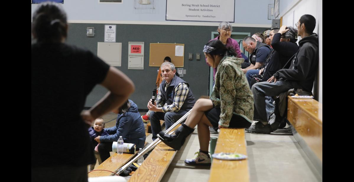 Photo by Diana Haecker LISTENING—Graphite One COO Mike Schaffner listens to questions at a public meeting held at the Teller school gym on Tuesday, June 2.