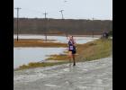 Lexi Blandford completed the Kotzebue XC Invitiational race with one shoe, after having lost the other one in a mud puddle. Photo by Chelsea Hubert