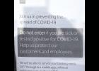 SIGNS OF THE TIME— Businesses post signs at their doors warning people to stay out if they are sick