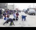 CANDY CANDY – Kids scramble for candy during the Midnight Sun Parade on Saturday, June 20 on Front Street.